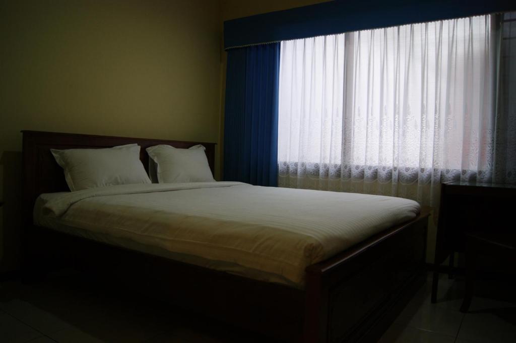 Grand Sumatera Hotel Сурабая Номер фото